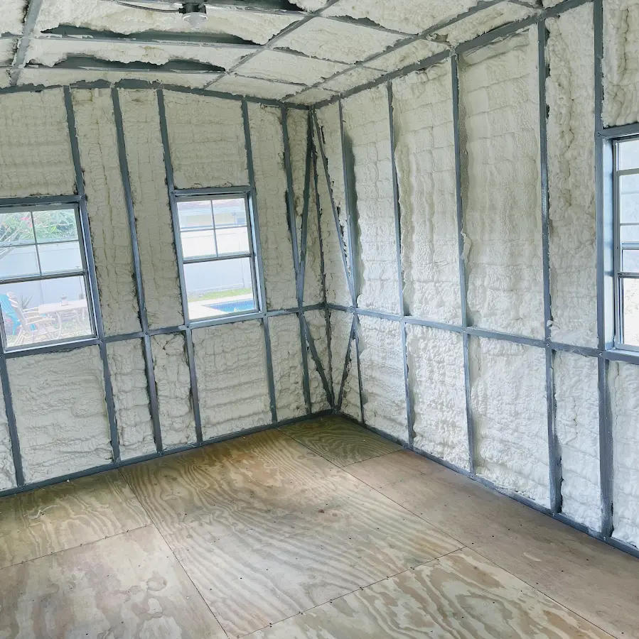 Closed-cell spray foam insulation applied to wall cavities in a residential project in Rosaryville